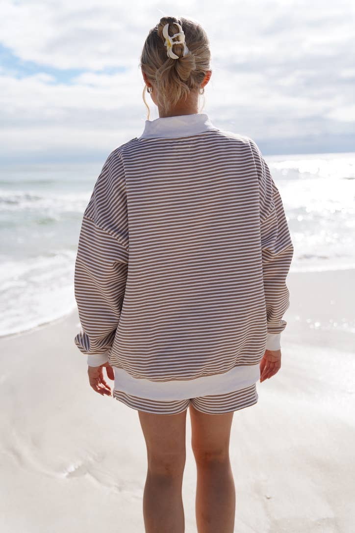 brown + white big striped mockneck sweatshirt