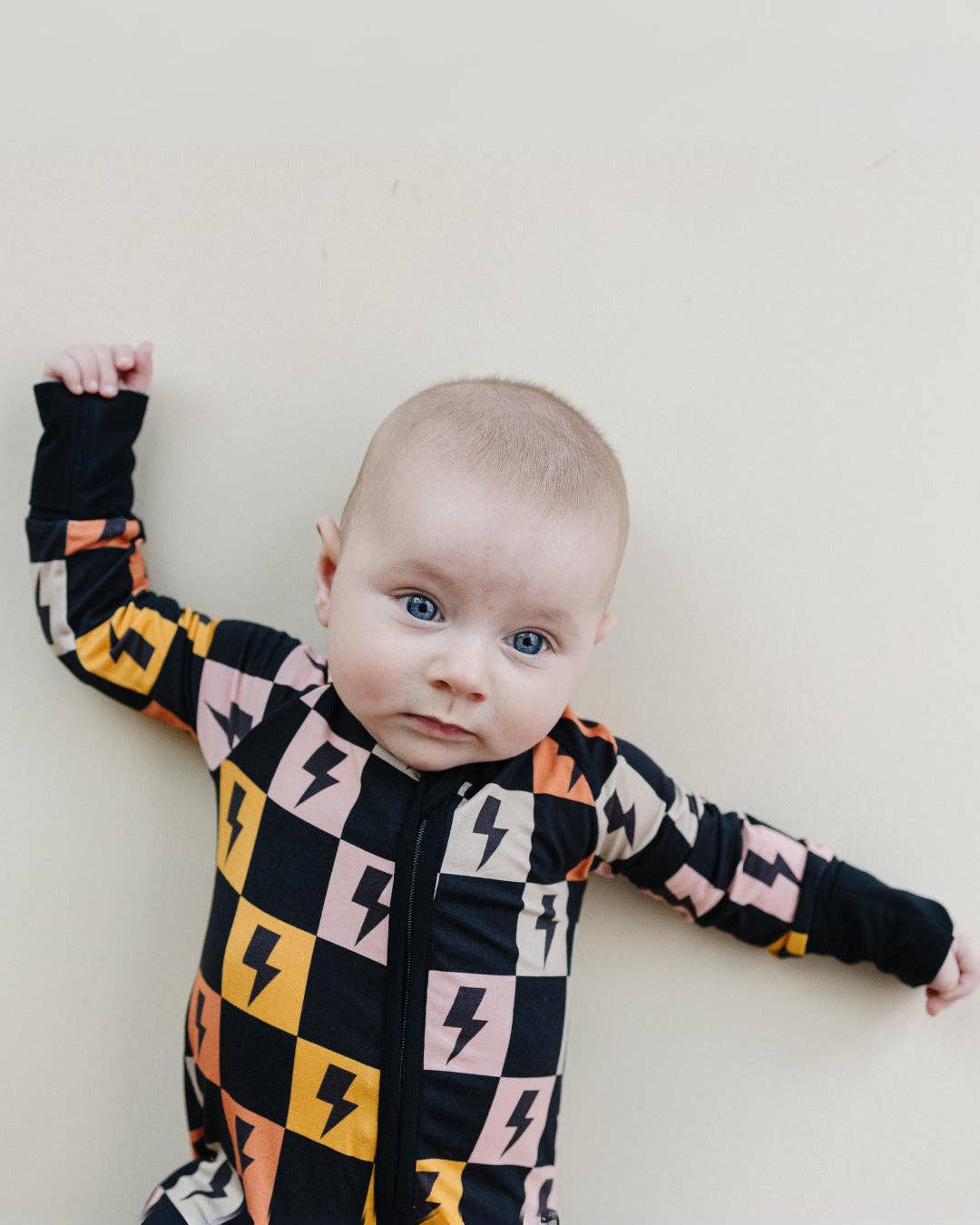 colorful checks & bolts zip romper