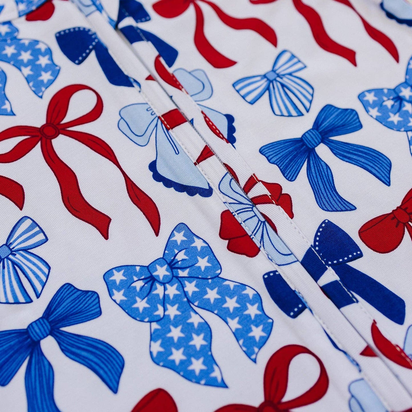 bamboo zip romper  | red-white + bows