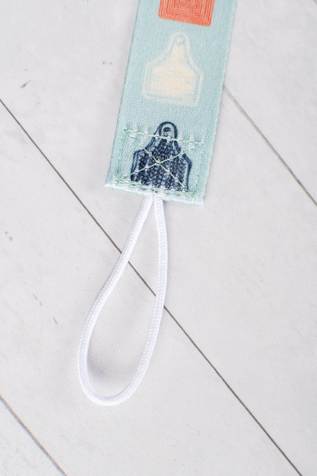 ear tags paci clip