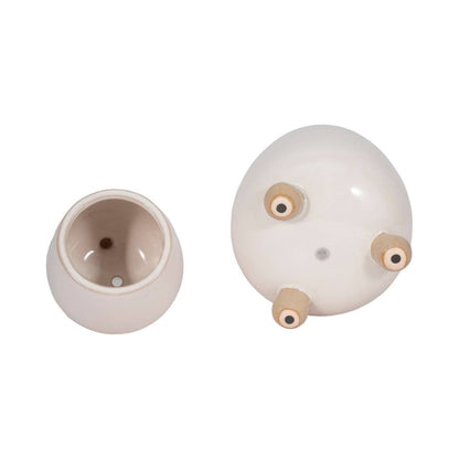 ivory round planter with knobby feet