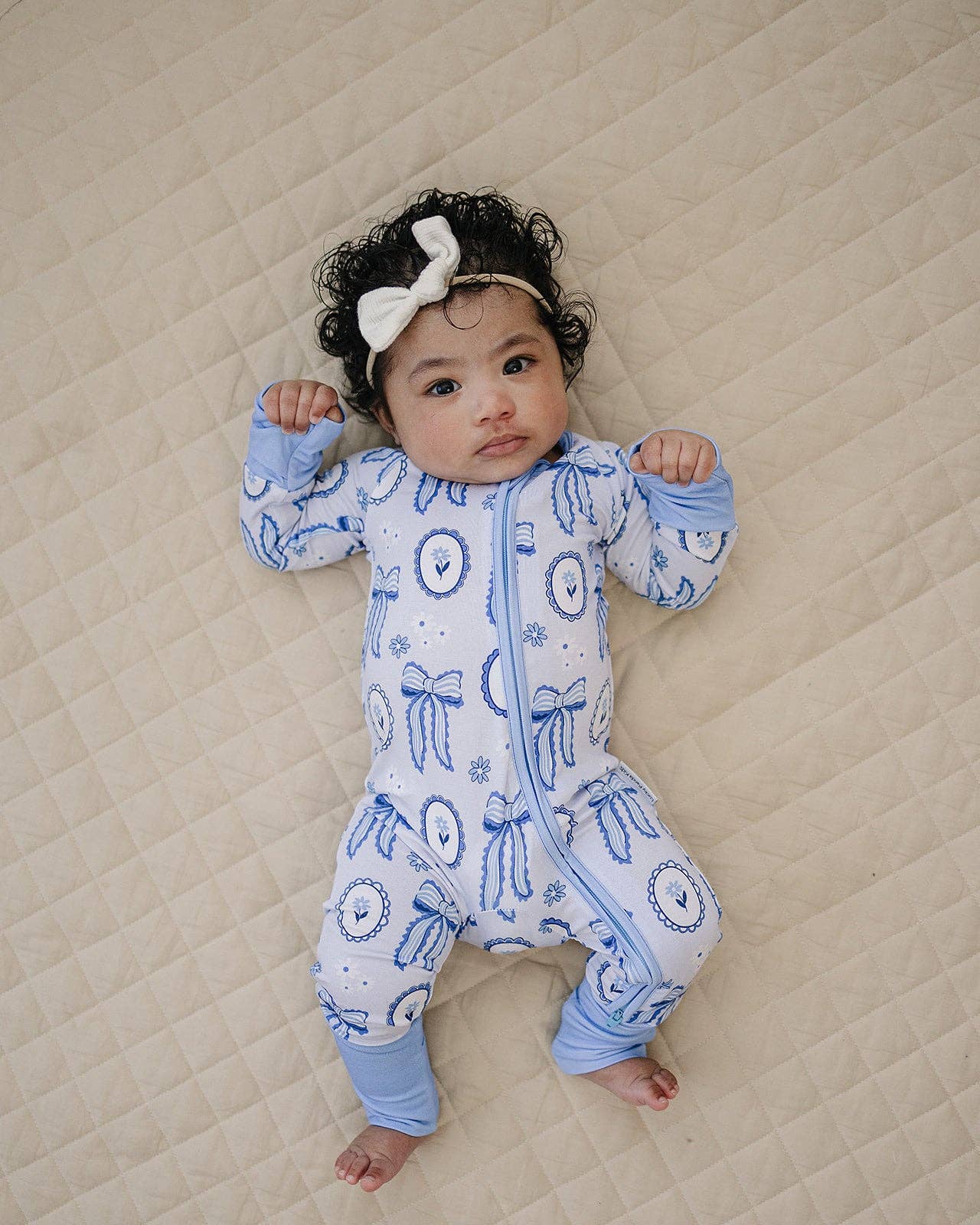 blue bow bamboo zip romper