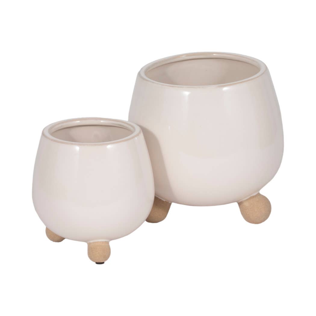 ivory round planter with knobby feet