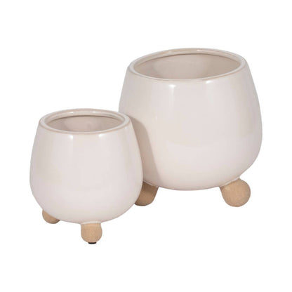 ivory round planter with knobby feet