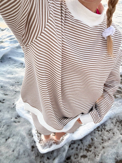 brown + white big striped mockneck sweatshirt