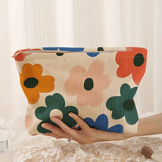 multi color floral corduroy makeup bag with a zipper